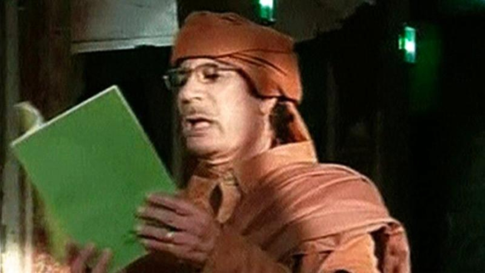 gaddafi reading-1.jpg